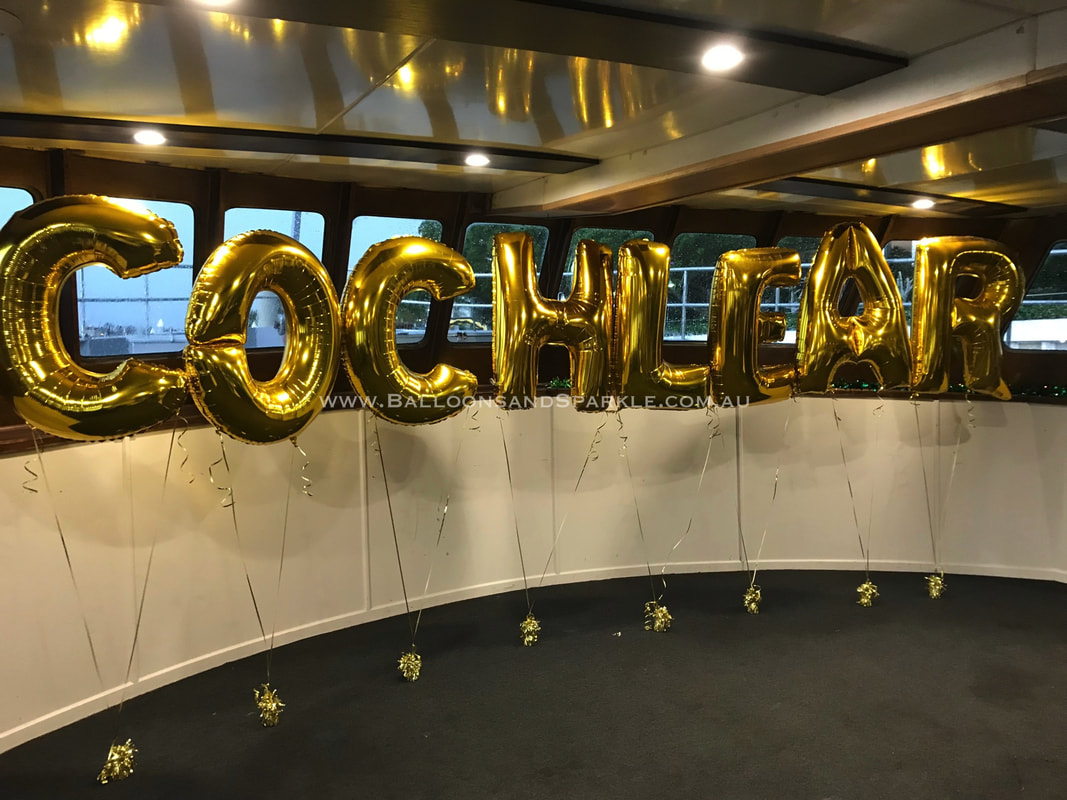 big silver balloon letters